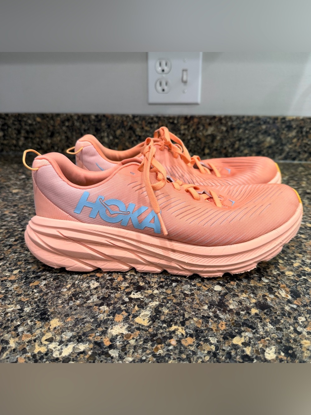 Hoka Coral /orange ladies 8.5 Sneakers with Light Blue Logo